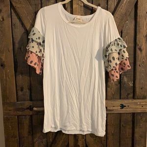 white top with ruffle sleeves